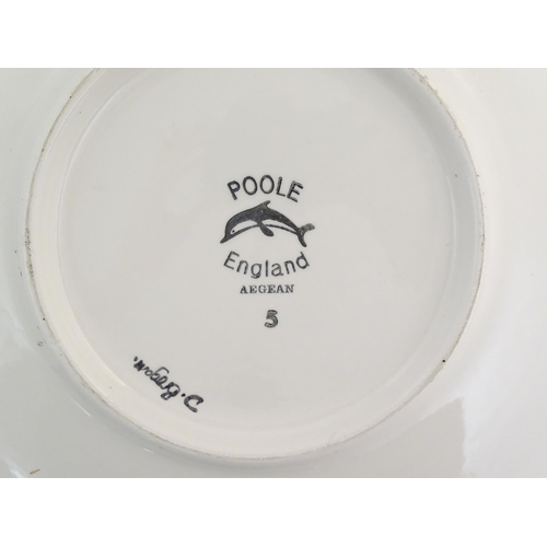 195 - A Poole Pottery charger in the pattern Aegean, with stylised galleon ship detail. Marked under and s... 