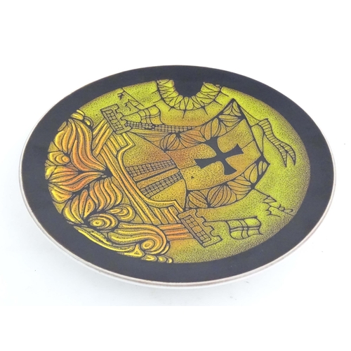 195 - A Poole Pottery charger in the pattern Aegean, with stylised galleon ship detail. Marked under and s... 