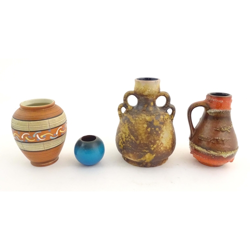 199 - Four West German vases to include a vase with banded decoration, a twin handled vase, a single handl... 