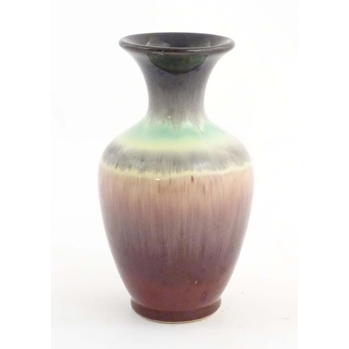 202 - A West German vase with a drip glaze, numbered 2093 under. Approx. 6