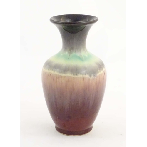 202 - A West German vase with a drip glaze, numbered 2093 under. Approx. 6