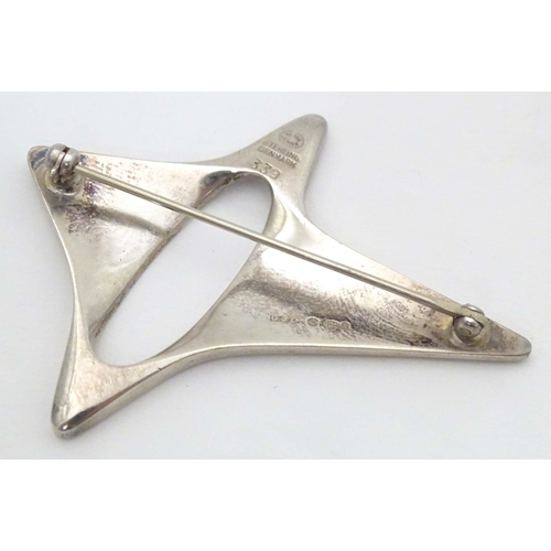 619 - Georg Jensen : A silver brooch of abstract design, designed by Henning Koppel for Georg Jensen. Mark... 