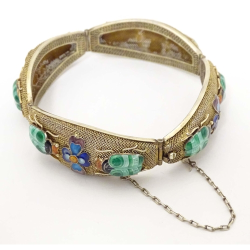 636 - An Oriental silver gilt bracelet with enamel floral and insect beetle decoration