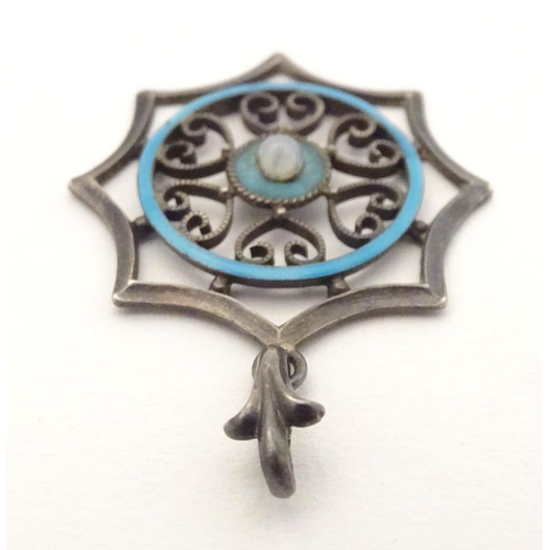 637 - Scandinavian silver : A silver pendant with enamel decoration. marked 935 Silver. Approx 1