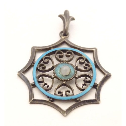 637 - Scandinavian silver : A silver pendant with enamel decoration. marked 935 Silver. Approx 1