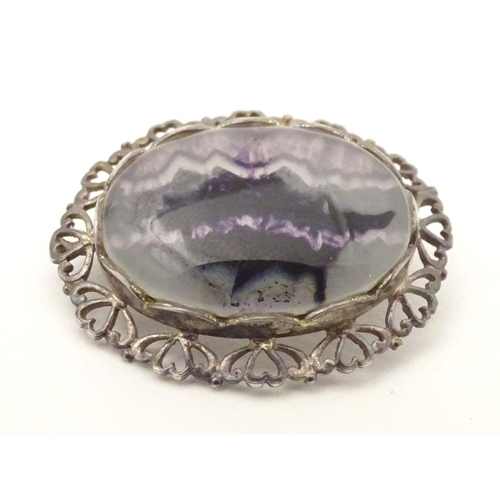 677 - A silver brooch set with blue john style cabochon to centre, hallmarked Sheffield 1985, maker E. L. ... 