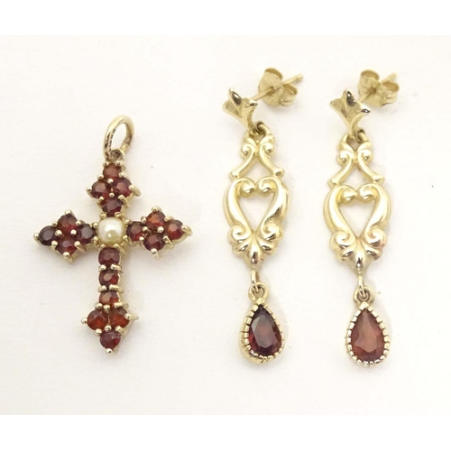 681 - A 9ct gold pendant of cross shape set with garnets and pearl to centre. Together with a pair of 9ct ... 