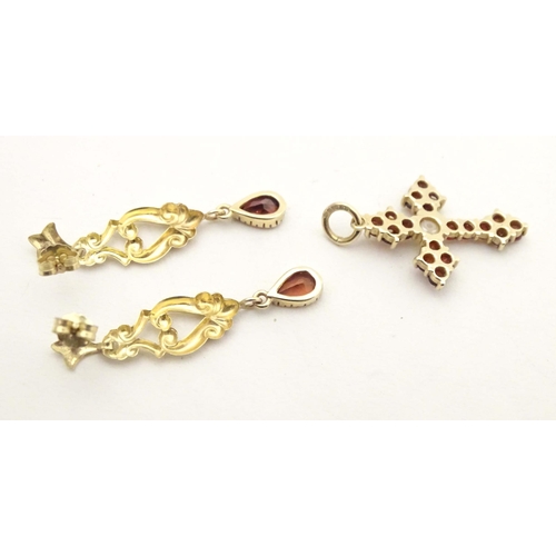 681 - A 9ct gold pendant of cross shape set with garnets and pearl to centre. Together with a pair of 9ct ... 