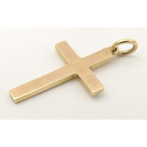 685 - A 9ct gold pendant of cross form with a 9ct gold chain, together with a yellow metal pendant of cros... 