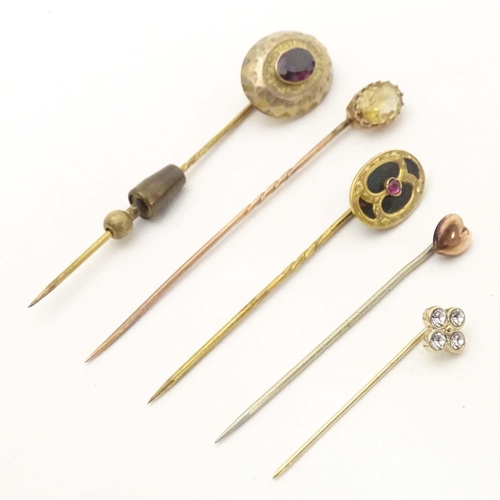 699 - Five assorted 19thC and later stick pins to include one set with bloodstone and central garnet, anot... 