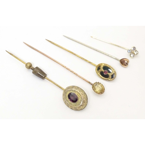 699 - Five assorted 19thC and later stick pins to include one set with bloodstone and central garnet, anot... 