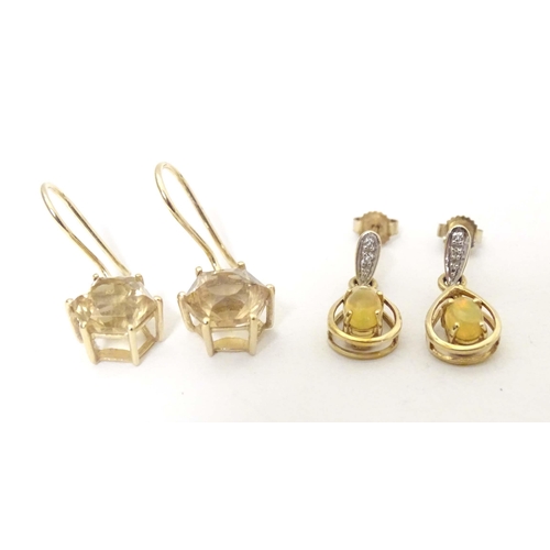 701 - 9ct gold drop earrings, to include one pair set with cabochon and chip set diamond, the other with f... 