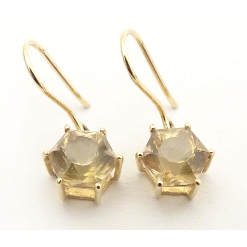 701 - 9ct gold drop earrings, to include one pair set with cabochon and chip set diamond, the other with f... 