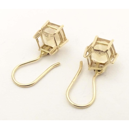 701 - 9ct gold drop earrings, to include one pair set with cabochon and chip set diamond, the other with f... 