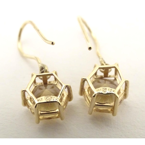 701 - 9ct gold drop earrings, to include one pair set with cabochon and chip set diamond, the other with f... 