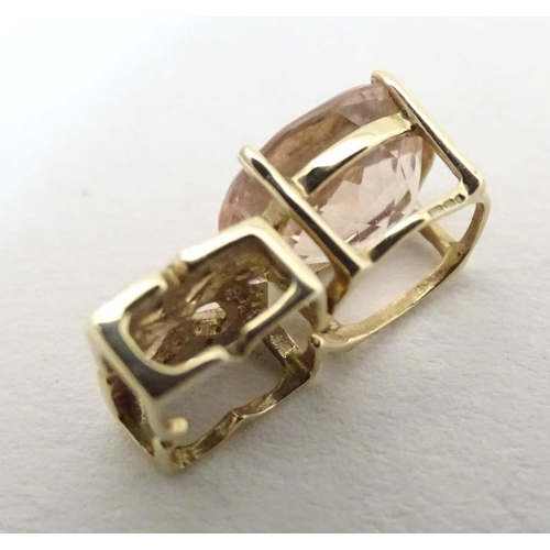 708 - A 9ct gold pendant set with morganite stone and chip set diamonds. Together with a pair of 9ct gold ... 