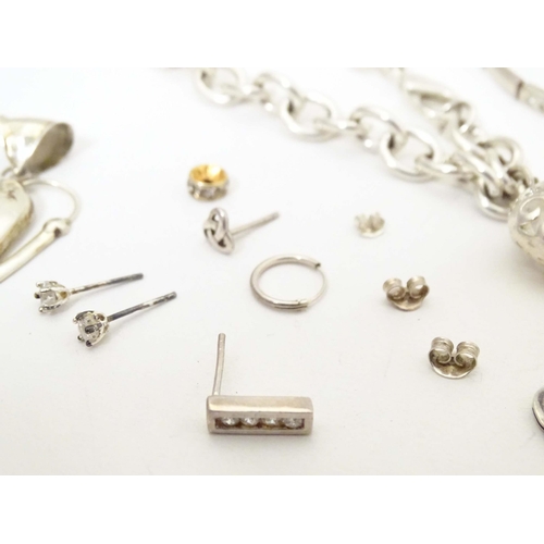 713 - A quantity of assorted silver and white metal jewellery to include bracelets, pendant, ring, etc.