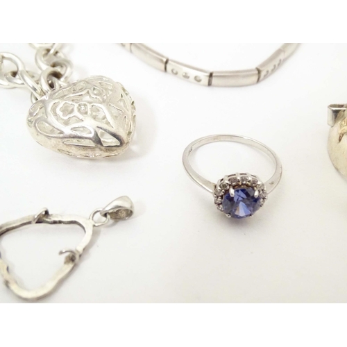 713 - A quantity of assorted silver and white metal jewellery to include bracelets, pendant, ring, etc.