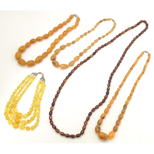 756 - Assorted vintage bead necklaces, to include some amber examples. (5)