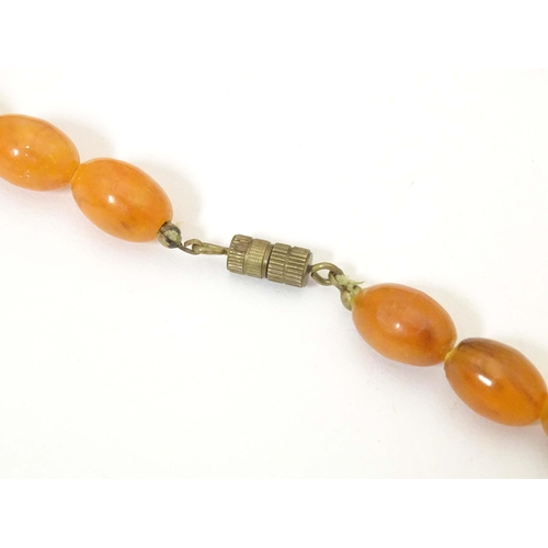 756 - Assorted vintage bead necklaces, to include some amber examples. (5)