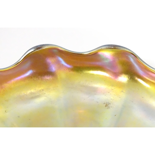 1000 - Tiffany Glass : Two Louis Comfort Tiffany Favrile glass finger bowls and stands. Signed under 'L.C.T... 