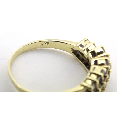 566 - An 18ct gold dress ring set with 21 diamonds. Ring size approx P