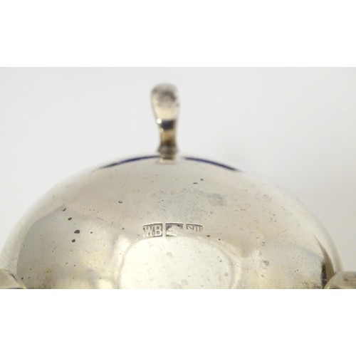 331 - An early 20thC Indian silver two piece cruet comprising salt and mustard pot, maker Warner Brothers ... 