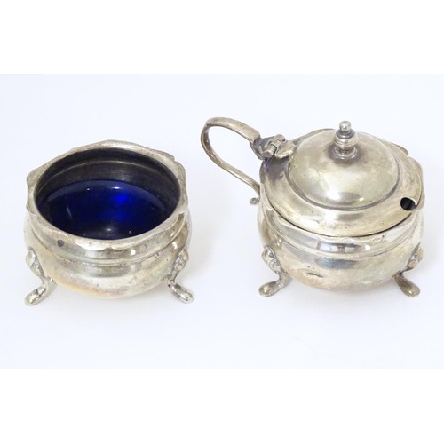 331 - An early 20thC Indian silver two piece cruet comprising salt and mustard pot, maker Warner Brothers ... 