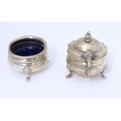 331 - An early 20thC Indian silver two piece cruet comprising salt and mustard pot, maker Warner Brothers ... 