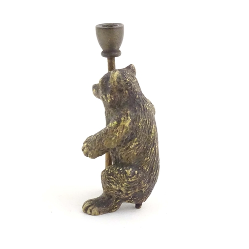 1013 - A novelty cold painted bronze model of a bear with a staff. Approx. 1 3/4