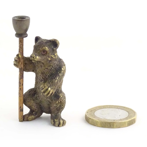 1013 - A novelty cold painted bronze model of a bear with a staff. Approx. 1 3/4