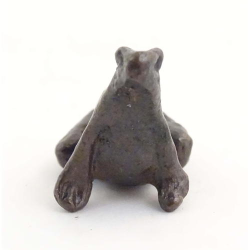 1014 - A cold painted bronze model of a seated frog. Approx. 1 1/4