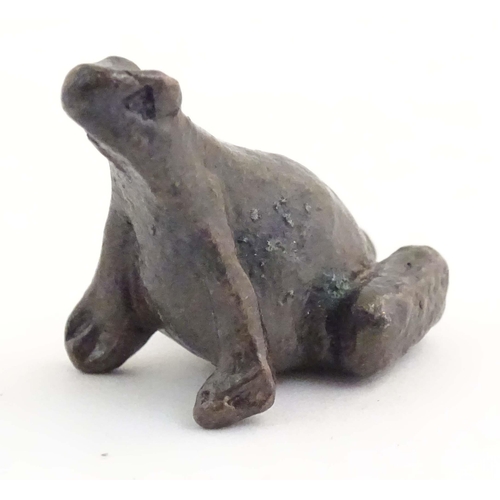 1014 - A cold painted bronze model of a seated frog. Approx. 1 1/4