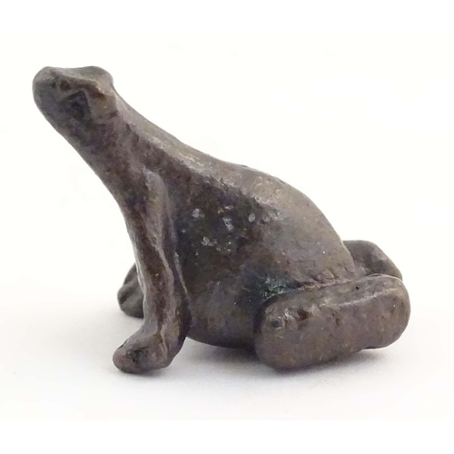 1014 - A cold painted bronze model of a seated frog. Approx. 1 1/4