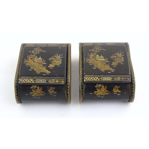 1059 - Two 20thC lacquered boxes with hinged lids decorated with chinoiserie decoration with pagodas in lan... 