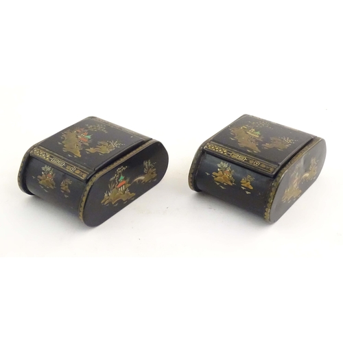 1059 - Two 20thC lacquered boxes with hinged lids decorated with chinoiserie decoration with pagodas in lan... 