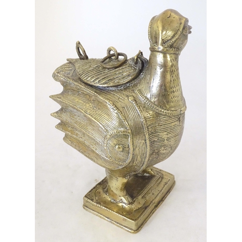 1261 - A late 19th / early 20thC Indian brass container modelled as a stylised duck with engraved decoratio... 