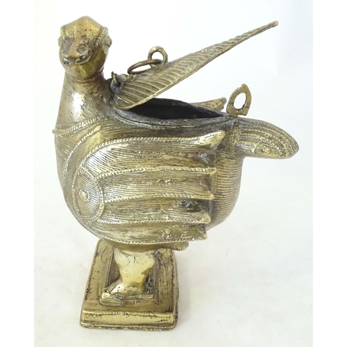 1261 - A late 19th / early 20thC Indian brass container modelled as a stylised duck with engraved decoratio... 