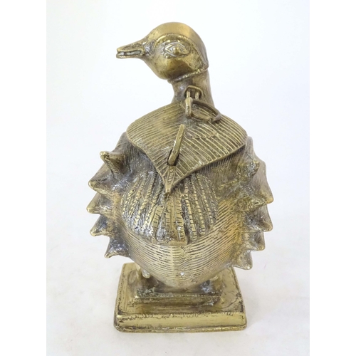 1261 - A late 19th / early 20thC Indian brass container modelled as a stylised duck with engraved decoratio... 