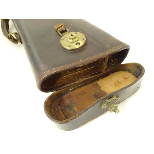 1262 - A late Victorian 'Leg o' Mutton' gun case, of leather construction, the interior with central divisi... 