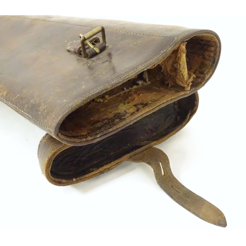 1262 - A late Victorian 'Leg o' Mutton' gun case, of leather construction, the interior with central divisi... 