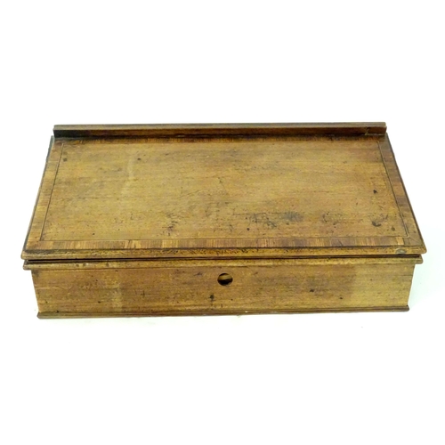 1268 - An early 19thC mahogany writing slope / lectern with a single drawer having four divisions. Approx. ... 