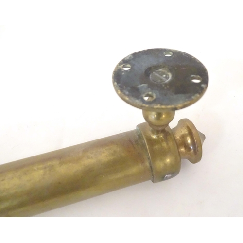 1289 - A Victorian brass towel rail, with wall mounts, 33 3/4