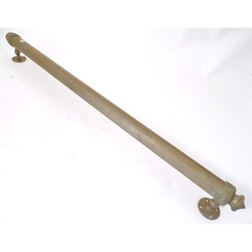 1289 - A Victorian brass towel rail, with wall mounts, 33 3/4