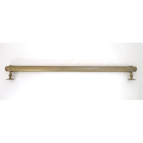 1289 - A Victorian brass towel rail, with wall mounts, 33 3/4