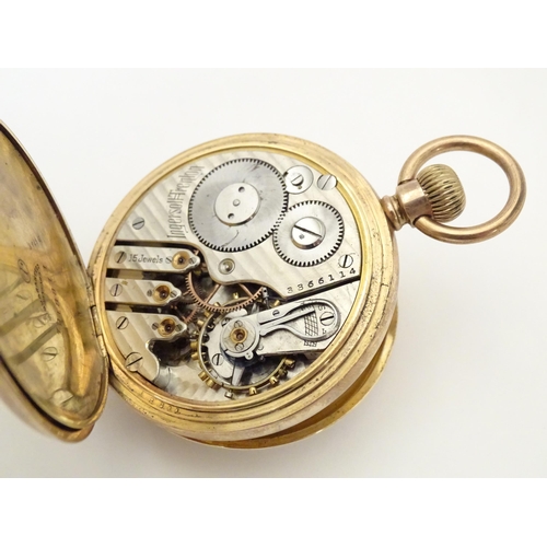 778 - An Ingersol - Trenton 15 jewel pocket watch in a gilt metal case, the enamel dial signed Ingersol-Tr... 