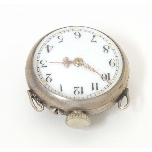 781 - A late 19thC / early 20thC small bulls eye style pocket watch with glazed front and back with white ... 