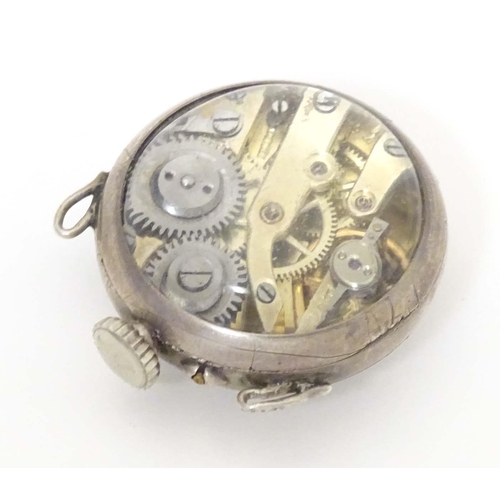 781 - A late 19thC / early 20thC small bulls eye style pocket watch with glazed front and back with white ... 