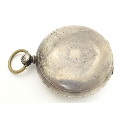 783 - A Victorian silver pocket watch hallmarked Chester 1871, the enamel dial with inset seconds dial and... 