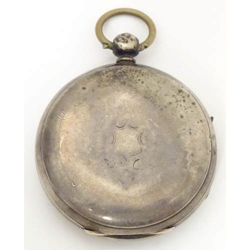 783 - A Victorian silver pocket watch hallmarked Chester 1871, the enamel dial with inset seconds dial and... 